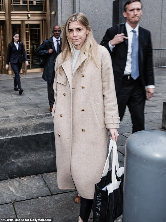 Graham Chase Robinson (pictured leaving court on Tuesday) claims De Niro treated her like his 'office lady' while she worked at his company Canal Productions