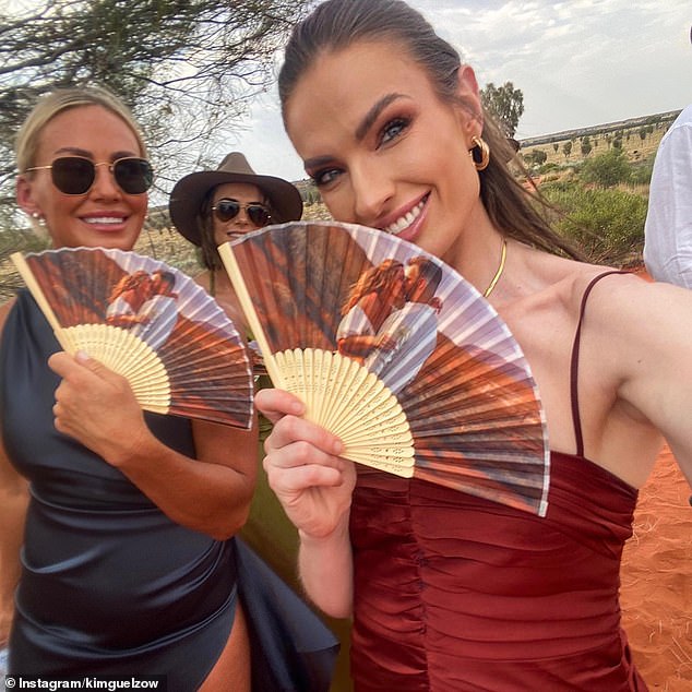 Guests at the wedding left fans with a sweet image of the couple