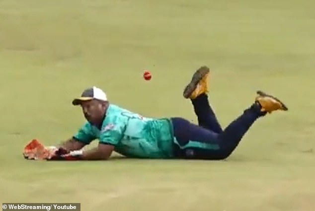 It looked like the wicketkeeper had taken an impressive diving catch, but the ball fell loose as it hit the ground