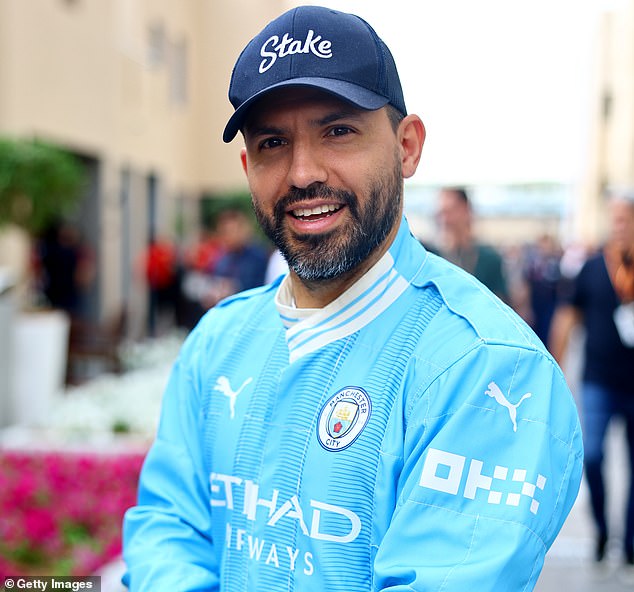 Sergio Aguero arrived at the Abu Dhabi GP paddock dressed in a Manchester City suit