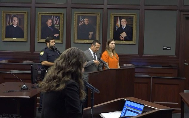 Gardner-Fernandez appeared in court wearing an orange jail-issue jumpsuit as her attorney pleaded not guilty to the charges