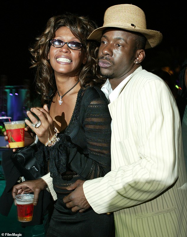 Whitney and her then-husband Bobby Brown pictured at the VH1 Divas Duets After Party at MGM Grand in 2003 - hours after the singer made the accusation