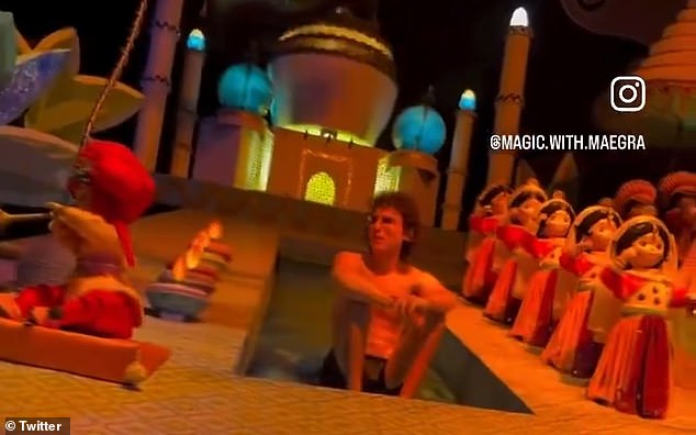 Smalls World: The bespectacled streaker stripped down to his underwear for the first time at the resort's It's a Small World exhibition