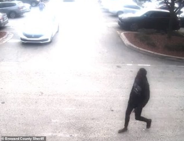 Surveillance footage shows McFadden emerging from the parking lot