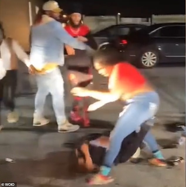 Taria Armstrong (pictured on the ground) was brutally attacked by three women outside the Hush Cabaret & Lounge on Saturday evening