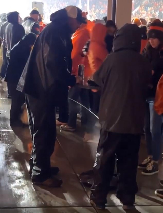 NOTHING TO SEE HERE, PEOPLE: A Washington-Oregon State fan urinating at Reser Stadium