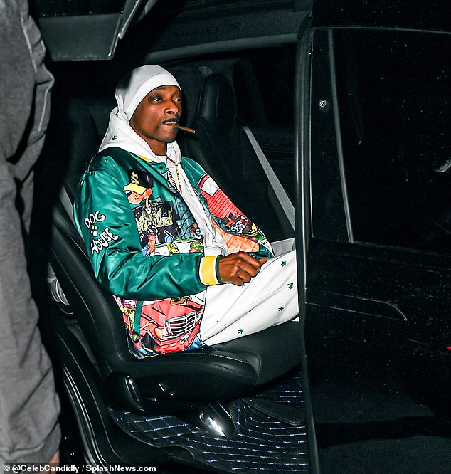 Back to work!  Snoop Dogg smoked a blunt in the backseat of a black SUV after dining in Santa Monica on Wednesday night, nearly a week after fooling many into believing he was giving up the habit