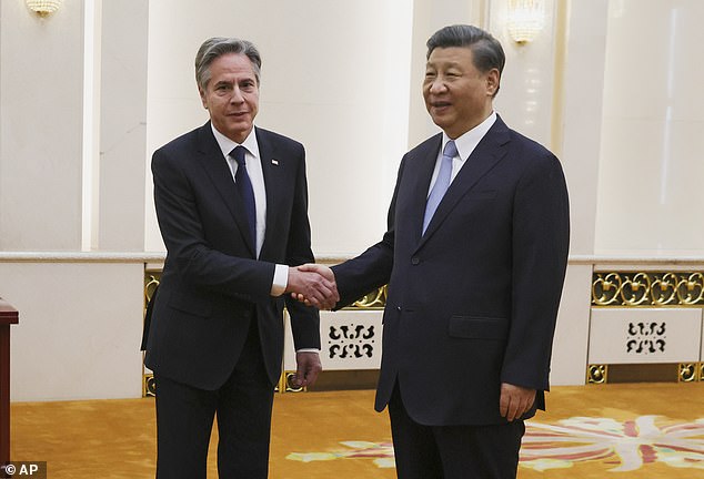 US Secretary of State Antony Blinken shakes hands with Chinese President Xi Jinping at the Great Hall of the People in Beijing, China, on June 19