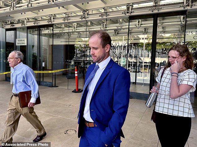 Stephen Tyler Bieneman walks out of a U.S. courthouse after the first day of his trial in Honolulu on November 6, 2023