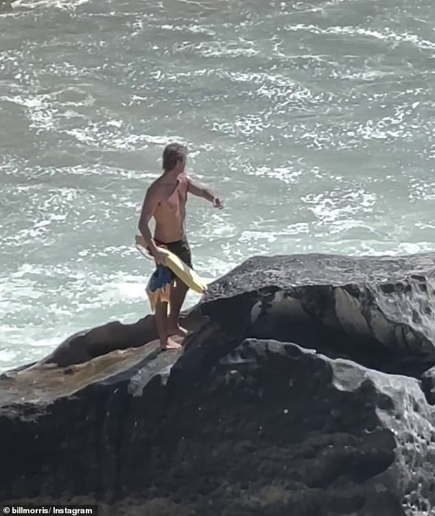 Bondi Rescue lifeguard Luke Faddy (pictured) rushed to the surfer's aid when he saw the man struggling near the rocks, before jumping into the water with nothing but his fins and a rescue strap over his shoulder.