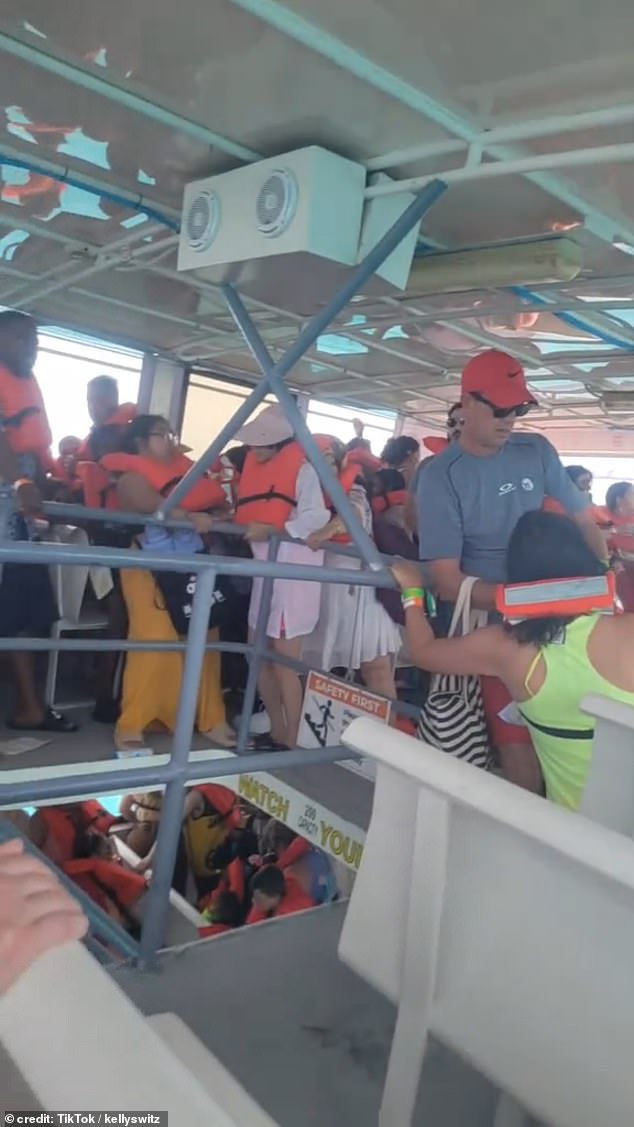 Dozens of passengers were seen wearing thick orange life jackets