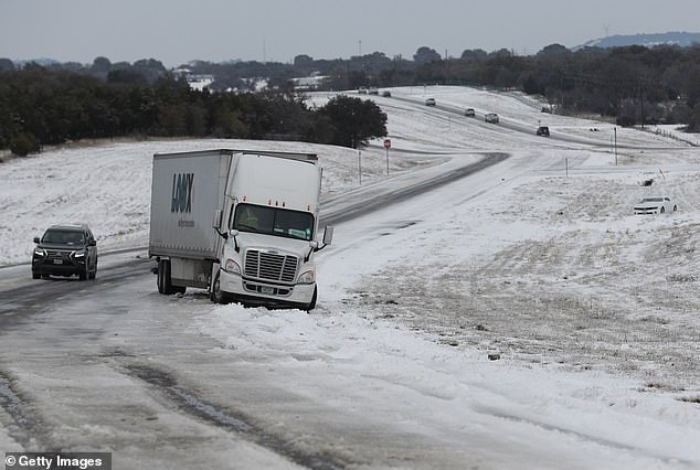 Texas officials warn of rolling blackouts to ease strain on