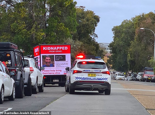 A mobile billboard displayed photos of kidnapped Israelis hung on a truck as they drove through Bondi on Sunday