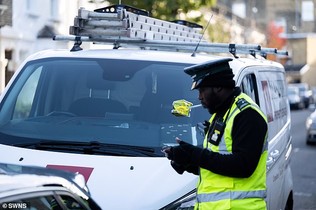 When a traffic warden places a parking ticket on a van parked in the shadow of Arsenal's Emirates Stadium, where drivers must pay a diesel charge of £6.50 per hour on top of the basic parking rate of between £2.50 and £6.30 per o'clock