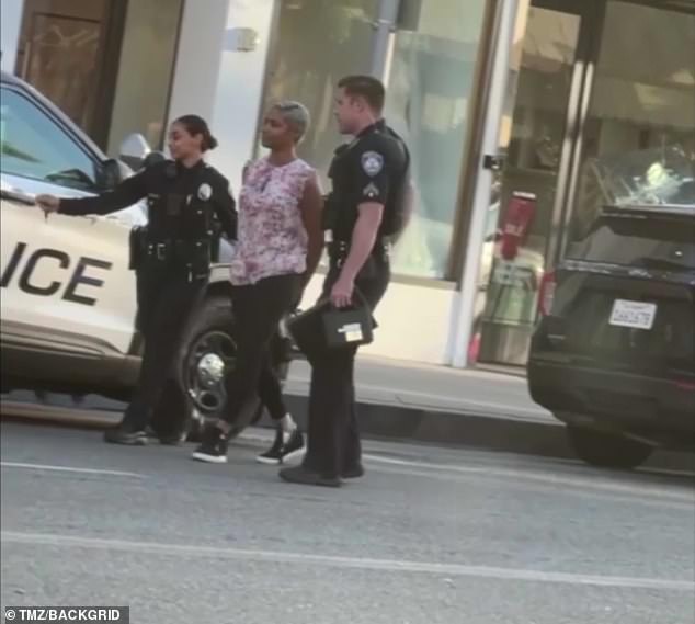 In custody: Tiffany Haddish was pictured in a new video and photos from her arrest early Friday morning in Beverly Hills