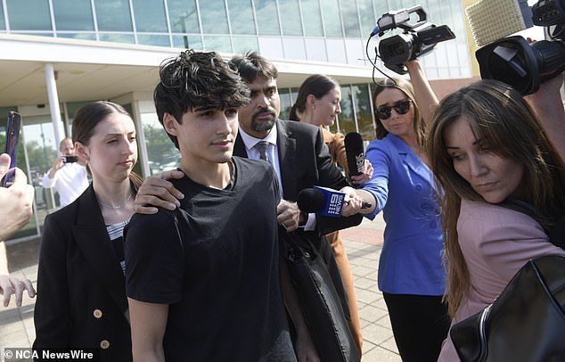 Dhirren Randhawa, 18, (pictured leaving Christies Beach Magistrates' Court in Adelaide on Monday) has been charged in the death of Charlie Stevens.  His mother is in pink on the right