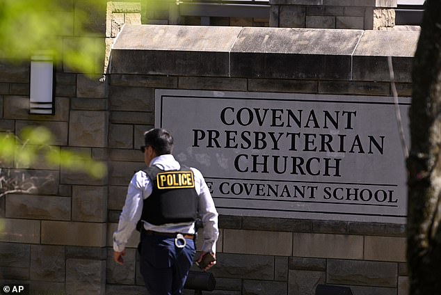 Willie, 47, of Nashville, Illinois, was charged in the U.S. District Court for the Southern District of Illinois with 14 felony counts of interstate communication of a threat to injure (Photo: A police officer walks past the entrance to The Covenant School in Nashville after the shooting )