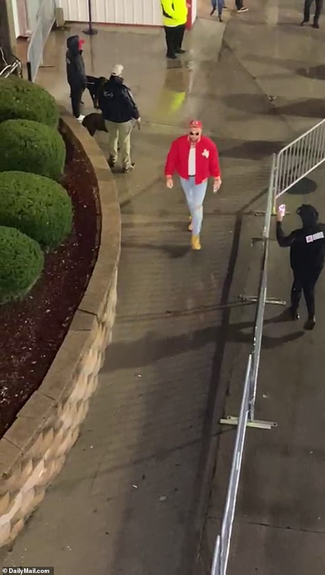 Travis Kelce was seen wearing a red jacket and Chief's hat as he entered Arrowhead