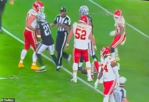 Travis Kelce, far left, got into an altercation with the Raiders' Amik Roberston in the third quarter