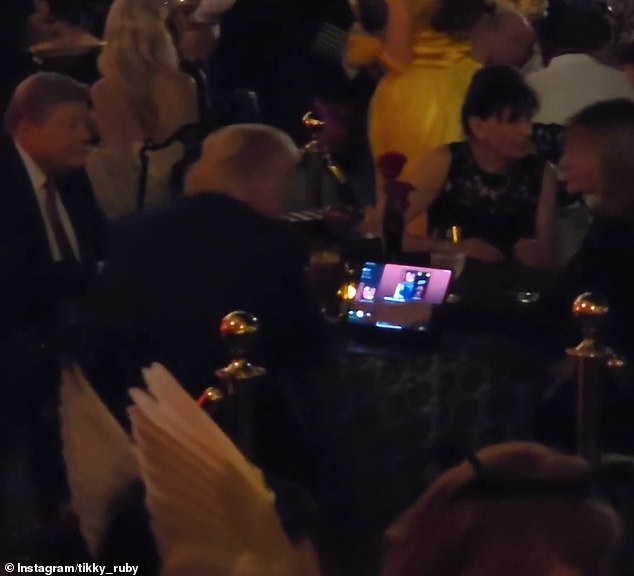 As the party atmosphere kicked in, Donald Trump took over DJ duties at Mar-a-Lago and appeared to play a Spotify playlist on shuffle - he's seen dining with Melania Trump and her parents Viktor Knavs and Amalija Knavs