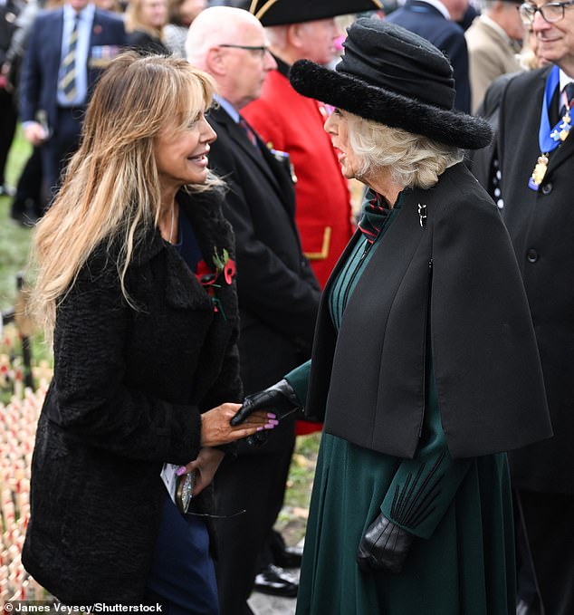 Happy days: Lizzie Cundy interacted with bona fide royalty on Thursday as she enjoyed a meeting with Queen Camilla during a visit to the Field Of Remembrance at Westminster Abbey in London