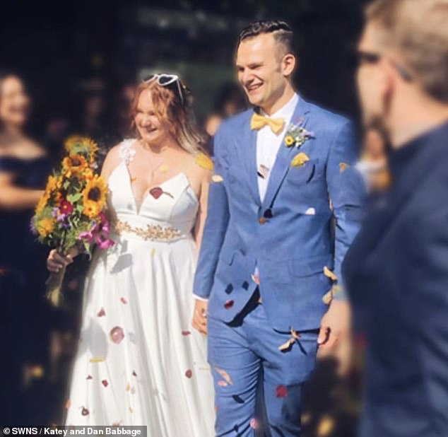 Pictured: Katey and Dan Babbage on their wedding day in September.  The couple has been together for seven years and started experimenting with 'non-monogamy' two years later