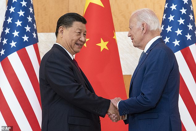 President Joe Biden, right, and Chinese President Xi Jinping shake hands before a meeting on the sidelines of the G20 summit in November 2022