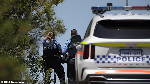 A man is in custody after the shooting.  Photo: NCA NewsWire / Sharon Smith