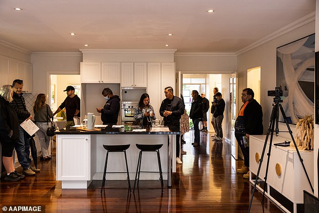 The Sydney resident said despite a good salary they could never buy a house because their parents never owned property (pictured, an auction in Melbourne)