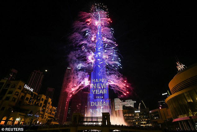 Fireworks explode from the Burj Khalifa, the tallest building in the world, during New Year's Eve celebrations in Dubai on January 1, 2023