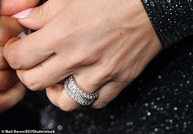 Pippen was seen wearing the jewel-encrusted band on the ring finger of her left hand