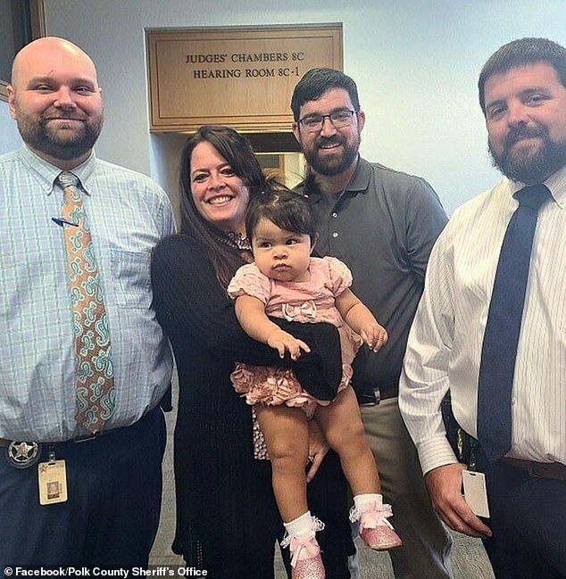 “We are excited to share with you these photos from this morning of this precious angel with her new mom and dad, along with PCSO's Detective Green and Sgt.  Ryan,” the Facebook post said