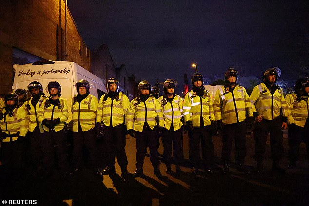 A line of police officers queued outside Villa Park last night