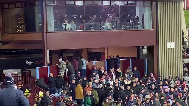 Villa fans were seen looking over a wall at Legia fans who had managed to break into Villa Park