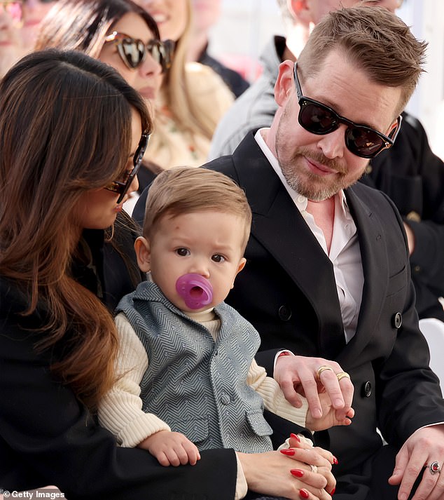 He was supported by his fiancée, actress Brenda Song, and both children;  his youngest son, named Carson, is pictured