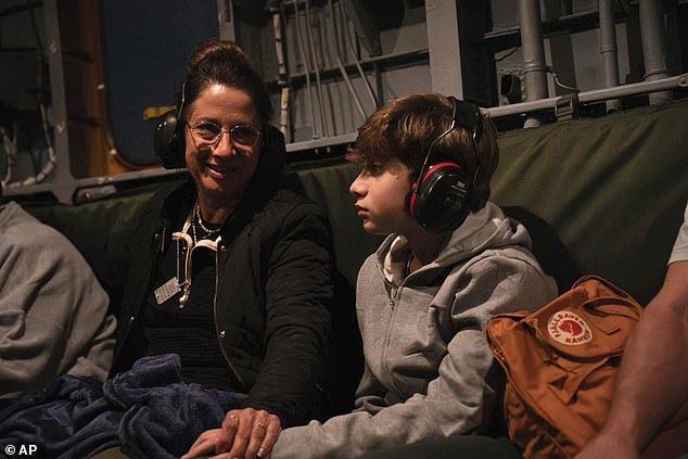 Yagil Yaakov, 13, is pictured returning to Israel in an IAF helicopter on Monday after spending more than 50 days as a hostage