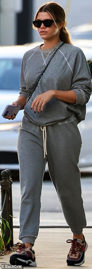 The 25-year-old daughter of Lionel Richie and sister of Nicole Richie was decked out in a cozy-looking gray sweatshirt