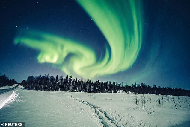 The northern and southern lights (aurora borealis) are natural light spectacles.  Here, the aurora borealis appears in the sky in Rovaniemi, Finland on February 6, 2020.