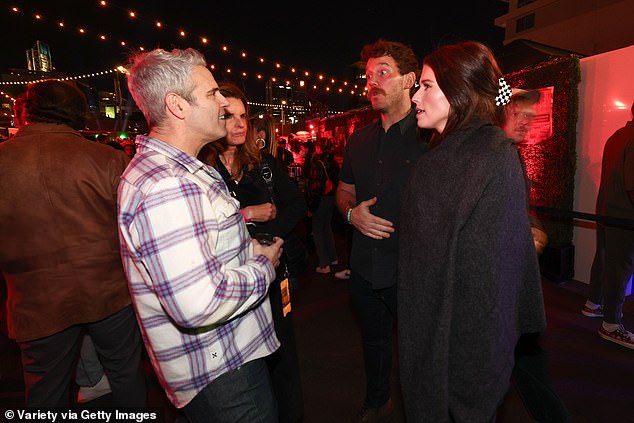 Andy was also seen chatting to actor Chris Pratt, 44, and his wife Katherine Schwarzenegger, 33, who kept warm in a gray coat