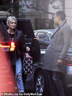 The two then reunited when their Uber arrived before heading to Holmes' apartment in Lower Manhattan in the black SUV