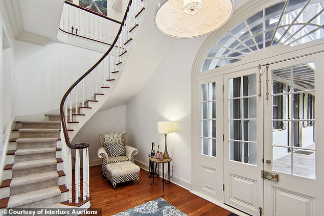 Although the property is complete with modern furnishings, it has been designed to retain the classic Parisian style, including a sleek white and cream theme and spiral staircases.