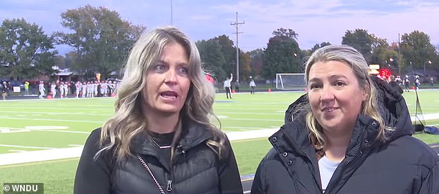 Lifelong friends Sarah Macon and Cassie Lee joined Flewellen at the football game