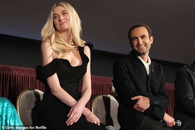 Debicki with Khalid Abdalia on stage at the premiere of the Netflix series in Los Angeles last month