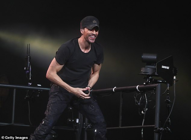 The singer grinned during his performance in Arizona last Saturday