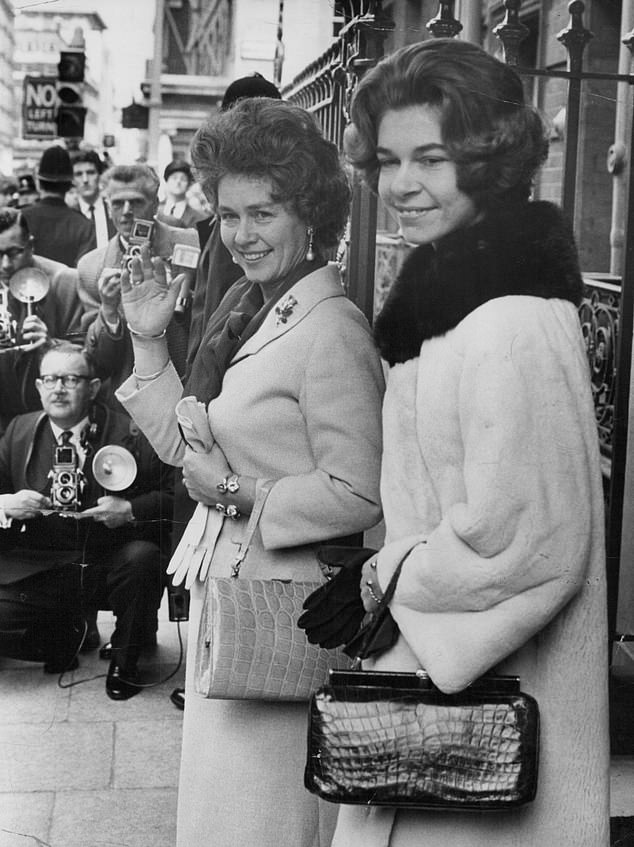 Queen Frederica of Greece and daughter Princess Irene are surrounded by photographers as they leave their hotel in London