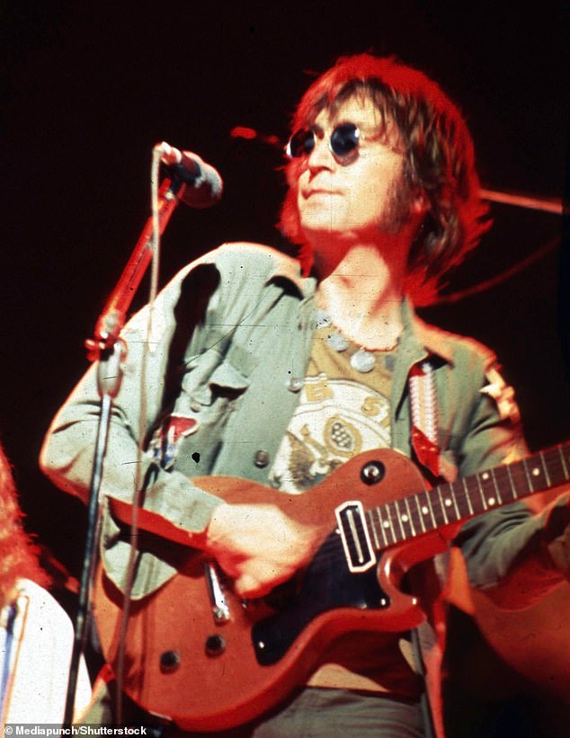 Lennon was the founder, co-songwriter, co-lead singer and rhythm guitarist of the Beatles