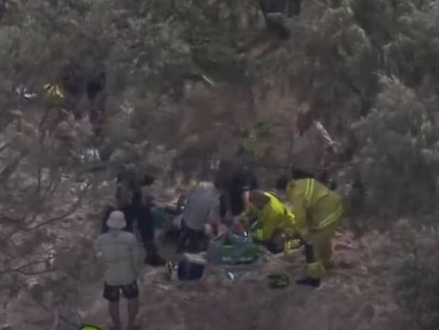 Paramedics and friends worked desperately to free him.  Photo: 7News