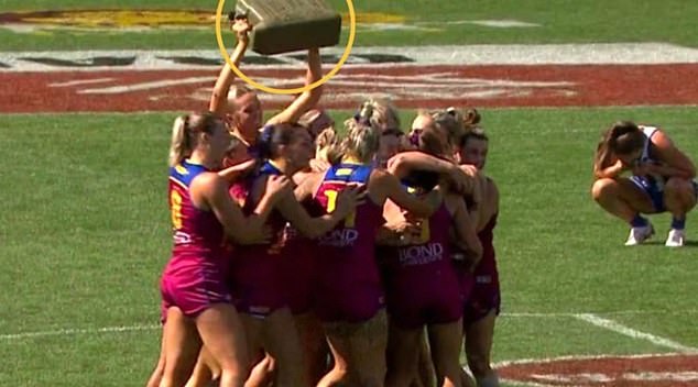 The Lions celebrated with a gas can after the final siren for one big reason