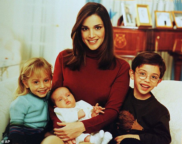 Rania grew up in a comfortable home in Tulkarm on the West Bank.  Here she is pictured with her three-month-old daughter, Princess Salma, Prince Hussein, right, and Princess Iman, left