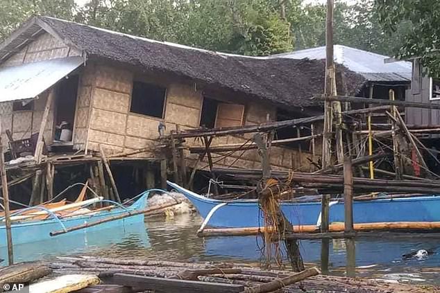 A pregnant woman died when she was hit by a 15-foot concrete wall that collapsed when the ground shook, prompting her to flee her home in Tagum town in Davao del Norte province.